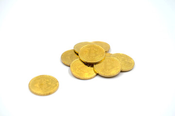 Golden bitcoins heap on white background. Conceptual image for crypto currency.