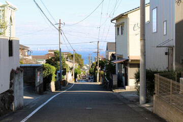 Fototapeta na wymiar Housing or residential area overlooking the sea around Beppu