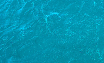 Fototapeta na wymiar Aquamarine blue water surface sea travel summer waves inspiration For wallpaper 