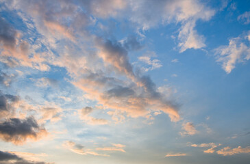 Naklejka na ściany i meble Beautiful clouds in the sunset sky