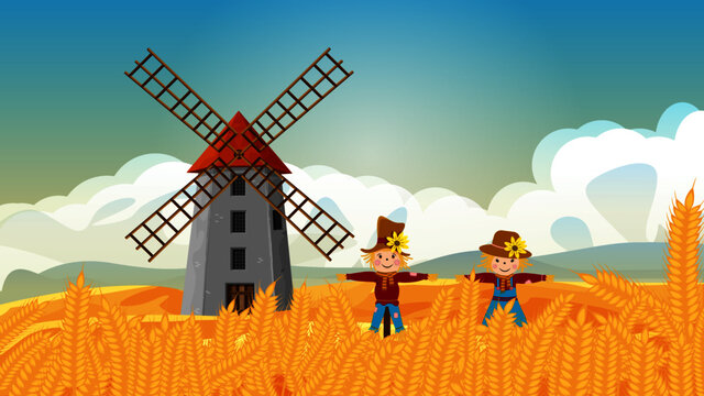 Windmill and scarecrow in a wheat field in autumn