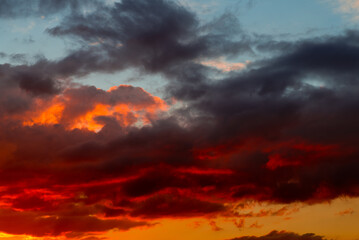 Fototapeta na wymiar Beautiful sunset. Red clouds in the sky
