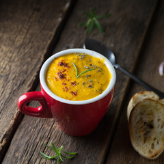 Hot pumpkin soup with croutons