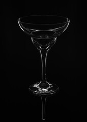 Glass for champagne and cocktail on black background