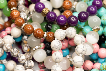 Different colorful beads. Macro shot. Selective focus.