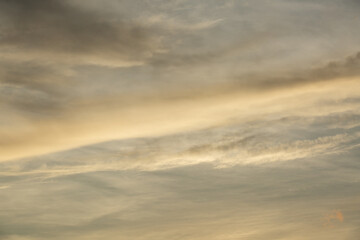 Beautiful sunset sky above clouds with dramatic light
