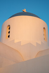 Fototapeta na wymiar Dome of a traditional Christian church at sunset. Greek churches