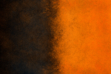 Watercolor grunge background divided in half into black and orange
