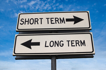 Short term road sign, arrow on blue sky background. One way blank road sign with copy space. Arrow...