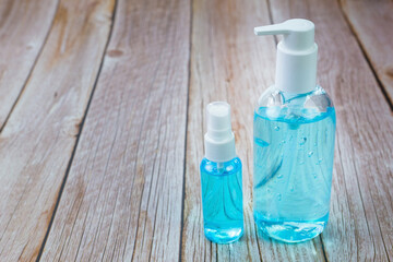 Instant antiseptic hand sanitizer mist spray, antibacterial alcohol liquid.
Alcohol gel,spray alcohol isolated on wood floor, Used to spray cleaning to prevent the virus, Covid 19 (Corona virus)