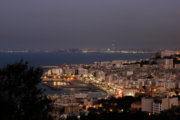 High cityscape on algiers coast in a cloudy night