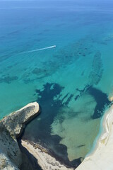 The beautiful turquoise ocean in the Ionian Sea surrounding the island of Corfu, Greece