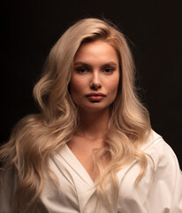 Fototapeta premium portrait of a young woman, shooting in a photo studio