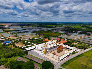 Nakhon Pathom / Thailand / August 09,2020 : Wat Charoen Rat Bamrung. The temple is very beautiful, the whole church And the Buddha statue in front of the magnificent temple