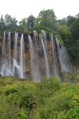 Naklejka premium The turquoise waters from the stunning waterfalls in the Plitvice Lakes National Park in Croatia