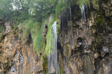 The turquoise waters from the stunning waterfalls in the Plitvice Lakes National Park in Croatia