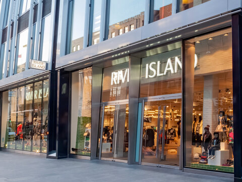 London, UK, Apr 2, 2011 : River Island clothing store at its retail business outlet at Park House Oxford Street which is a popular travel destination tourist attraction landmark stock photo image