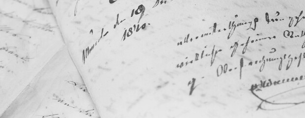 closeup of old handwriting; vintage paper background