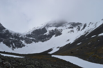 Fototapeta premium Hiking and climbing Kebnekaise, Sweden's highest peak, in Lapland
