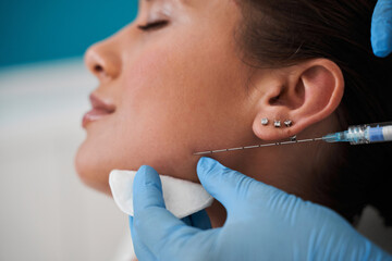 Woman receiving a botox injection
