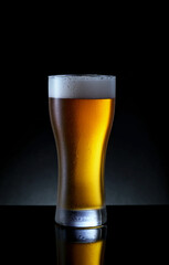 glass of beer on black background