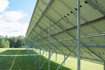 Fototapeta premium Solar panels backside. Alternative clean renewable energy source. 