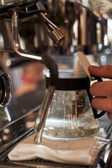 Pouring water steam pressure from machine