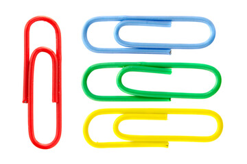 Collection of colorful paper clips isolated on white background, top view. Colored paper clips on a white background, top view. Five colored paper clips isolated on a white background.