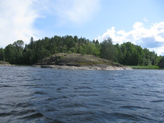 lake with rocky forest banks