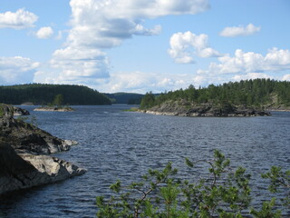 lake with rocky forest banks