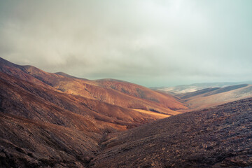 Mountain landscape view from Astronomical viewpoint Sicasumbre (Mirador Astronomico De Sica Sumbre). Fuerteventura. Canary Islands. Spain. Stylization. Toning.