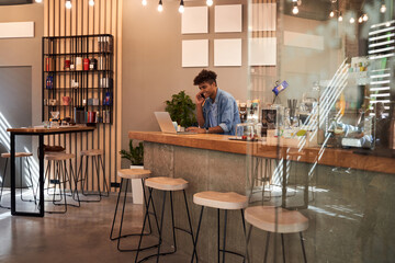 Man communicating by smartphone