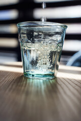 Close-up photo of a glass with water