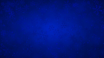 Christmas background of snowflakes of different shapes, sizes and transparency in blue colors