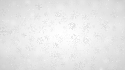 Christmas background of snowflakes of different shapes, sizes and transparency in gray and white colors