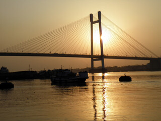 Fototapeta na wymiar Kolkata Riverfront on the banks of Ganga or Hooghly River, photo taken around sunset time.