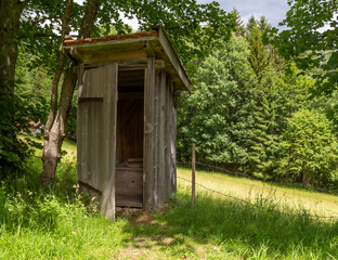 wooden pit latrine
