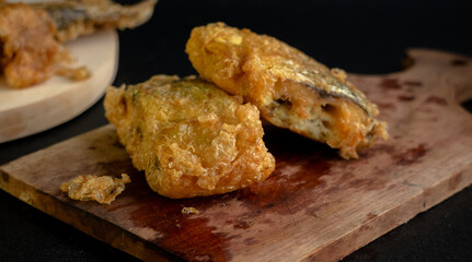 Bandeng Presto Goreng. Fried tendered-bone milkfish served with traditional side dishes