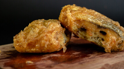 Bandeng Presto Goreng. Fried tendered-bone milkfish served with traditional side dishes