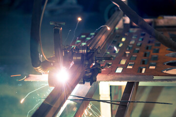 Plasma cutting of steel on a rack