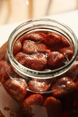 Delicious compote with strawberries in a jar