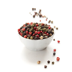 Peppercorn mix in bowl on the white background