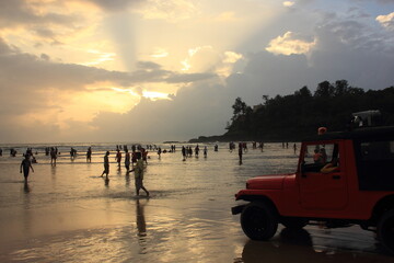 Sunset at Baga Beach, Goa, India - obrazy, fototapety, plakaty