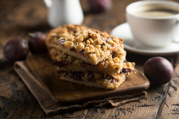 Traditional homemade plum pie with streusel
