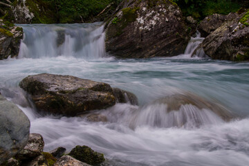 Fototapeta na wymiar water stream in the mountains