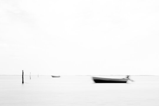 black and white image of two fishing boats in the baltic sea