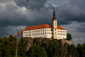 Fototapeta na wymiar Decin castle with dramatic sky, Czech republic