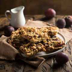 Traditional homemade plum pie with streusel