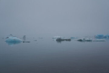 single small Icebergs in Jokulsarlon, blue cold lake