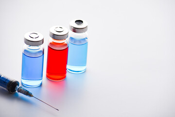 medical ampoules or vials with syringe isolated on white background. Medical vial and ampoules for injection and syringe. medicines and disease treatment. pharmacology and science. Copy space.